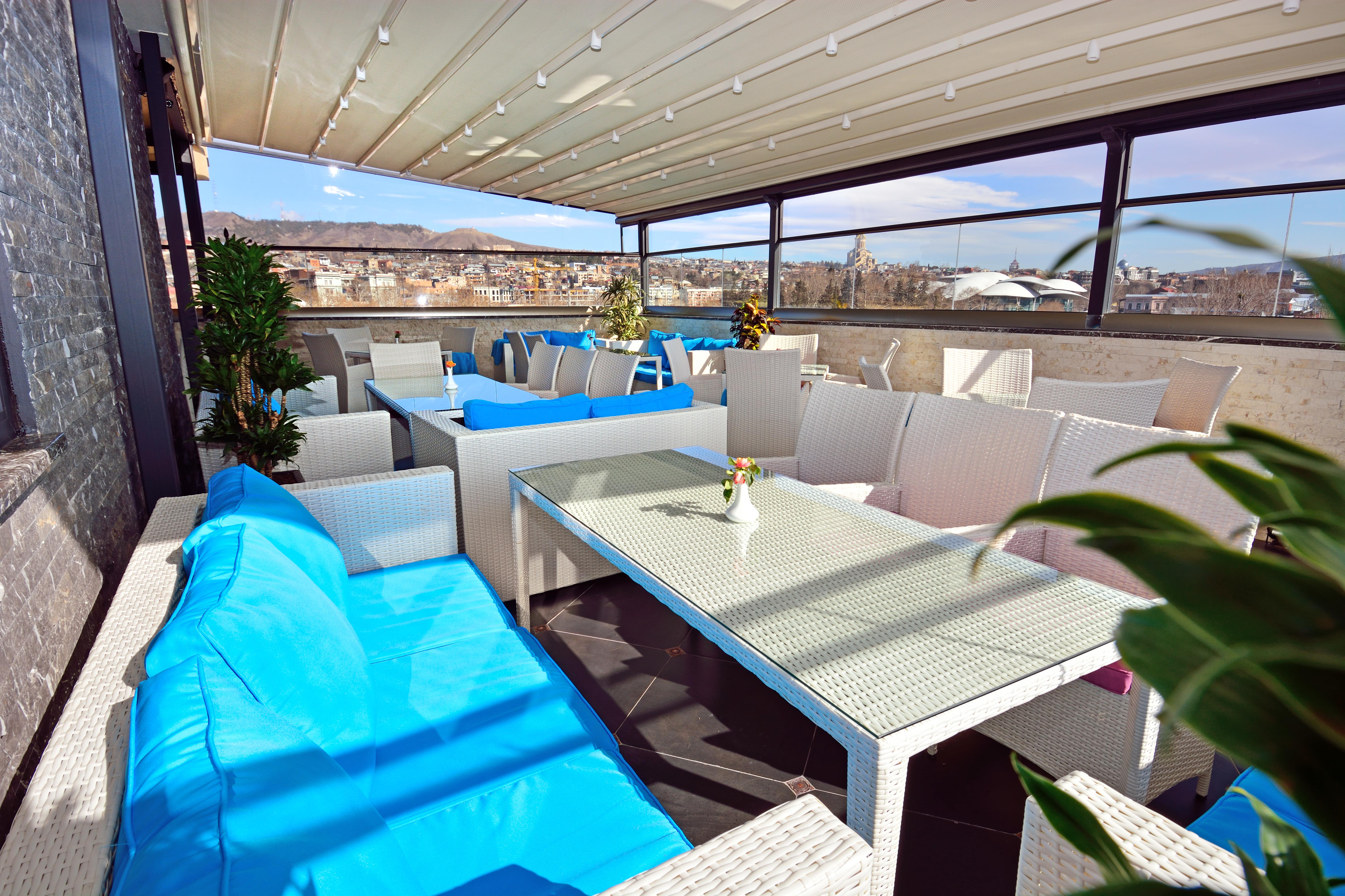 River Side Hotel Tbilisi Exterior foto A 3D rendering of a balcony